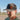 Dumbfuckery leather patch hat with side patch on grey and black trucker hat